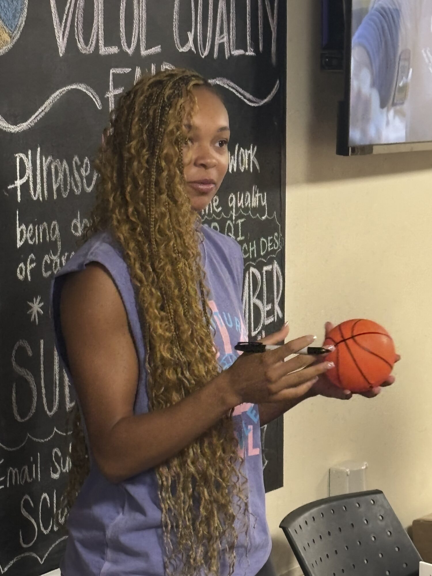 Hannah Signing Basketballs