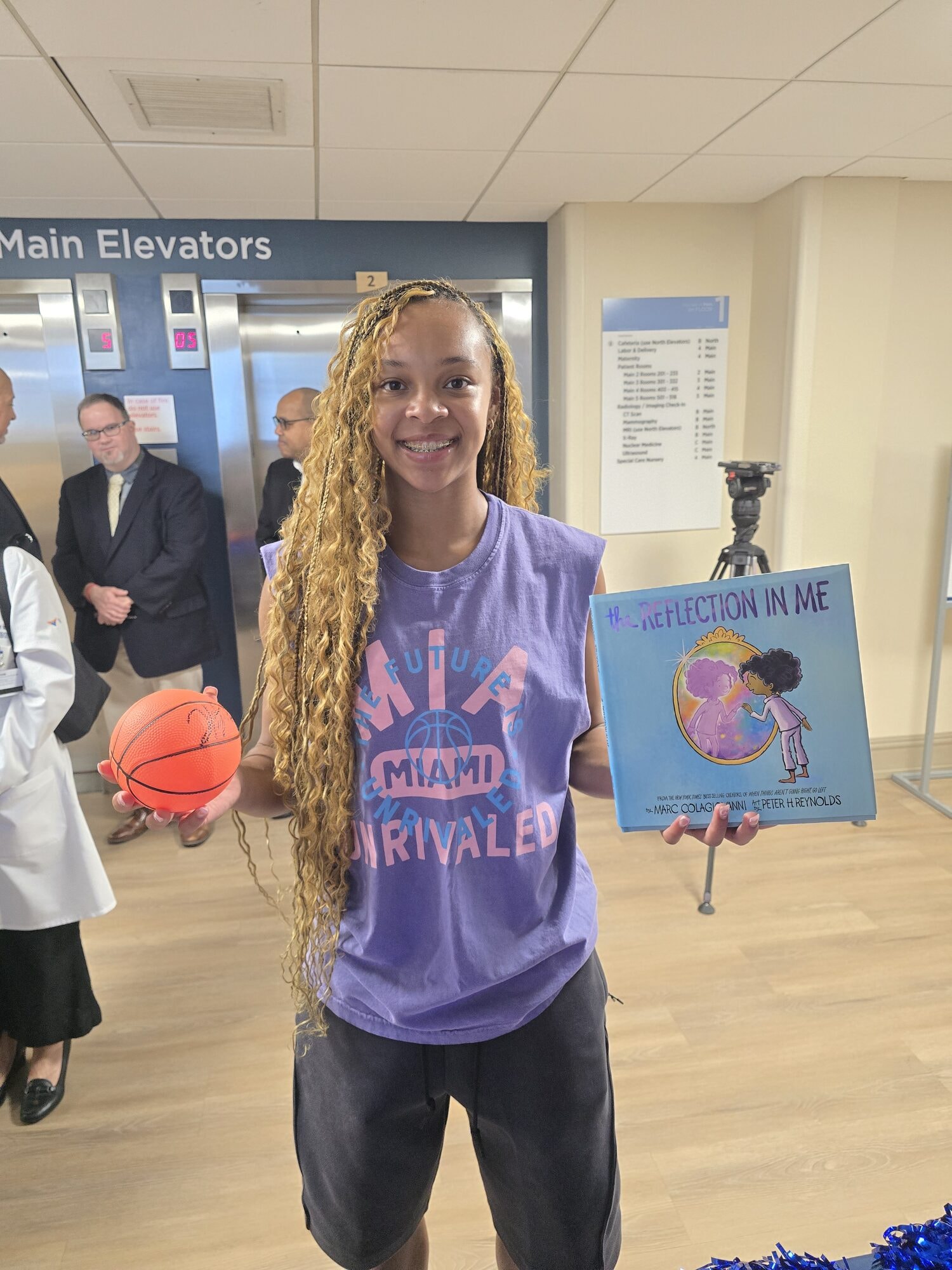 Hannah with Books & Basketball